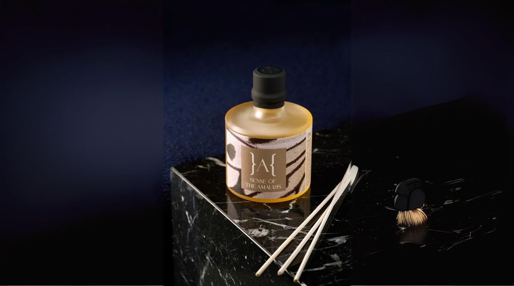 a bottle of liquid on a marble surface